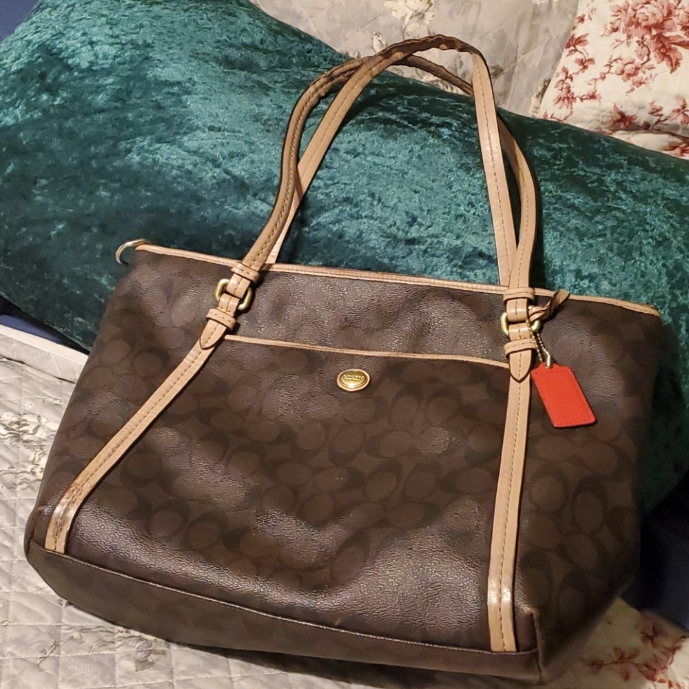 Coach purse , dark brown with c's.